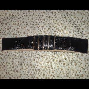 Vintage 1970s black leather belt with gold accent
